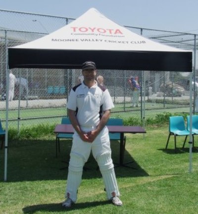 Our Mickster: Michael Cumbo stands in front of the Club's Toyota marquee as he celebrates his 150th game.