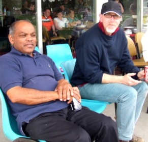Interested dad Kris Amunugama sits with Junior Co-ordinator Kevin Gardiner to assess the form of the Thirds.