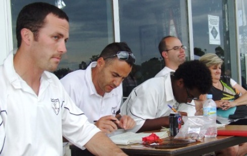 Taking in all the action on the field: Players, scorers and supporters: From left: Michael Ozbun, Sam Carbone, Shan Amunugama, Michael Cumbo and Jeanette Wright.