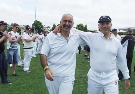 Joe (left) and John enter the arena together after coming through an  honor guard of past and present players.