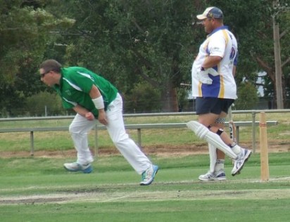 Captain Daniel Phillips bowls in Game 2.