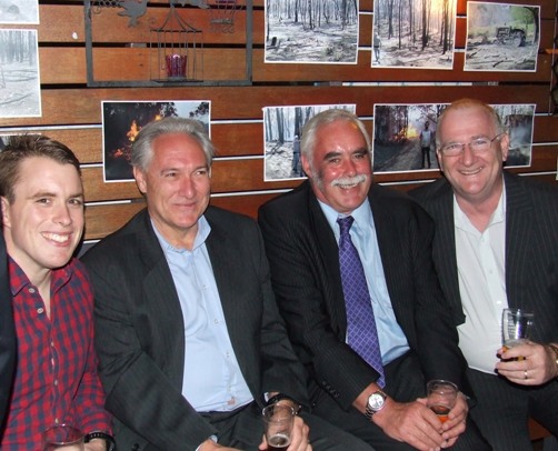 L-R: Nigel Walker, his big boss Rod Wilson, Charlie Walker and Jim Tennison swap stories at the fundraiser.