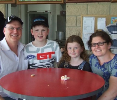 Doug didn't leave a scrap of food! Sixths skipper Doug Cumming with Under 14s son Jack, and with wife Libby and daughter Maddy.