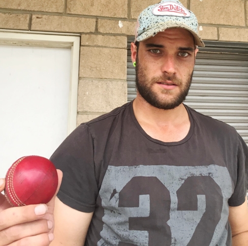 Jesse Felle with his double hat-trick ball.