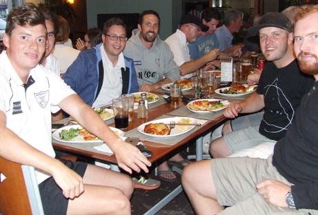 Tucking into the parmas: L-R Daniel Comande, Nick Brelis, Michael Ozbun, Kevin Gardiner, Daniel & Chris Ayers, Heath Webb-Johnson and Nate Wolland.