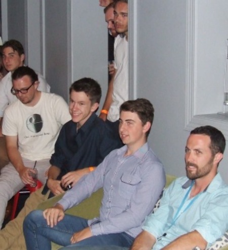 The tension of the count: Watching intently are (from left) Stephen Esmore, Mick Bannister, Alex Steinmeyer, Matt Esmore and Michael Ozbun, while Nate Wolland and Luke Brock look on anxiously through the doorway.n