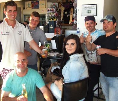 Getting ready for the poker tournament: L-R Jesse Nankivell-Sandor, Michael Cumbo (front), Dan Comande, Vanessa Riggio, Matt Thomas and Anthony Riggio.