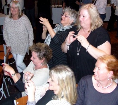 WAGS gather for the camera shoot for Curran's Raiders: L-R Adele Walker, Mary Curran, Melissa, Julia Raath, Bernadette Hobbs and Kelly Wright.