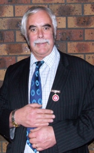 Moonee Valley President Charlie Walker with his Life Member badge bestowed by the North West Metropolitan Cricket Association.