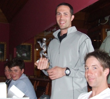 Winter Comp captain Michael Ozbun was handing out the awards, watched by (from left) Freddie Priestley, Dan Comande and Ben Thomas.