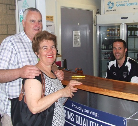 Richard Cooney and wife Vicki enjoy the services of Michael Ozbun behind the bar.