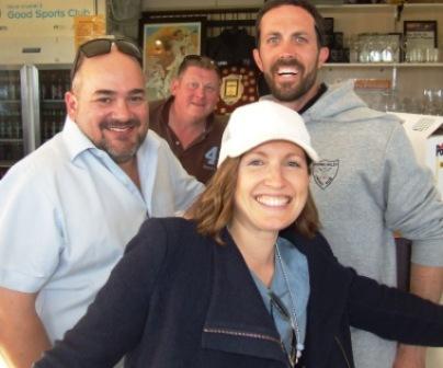 Festive fun: Lisa Morgan cuts a fine figure in front of (L-R) James Harris, Simon Thornton and boyfriend Michael Ozbun.