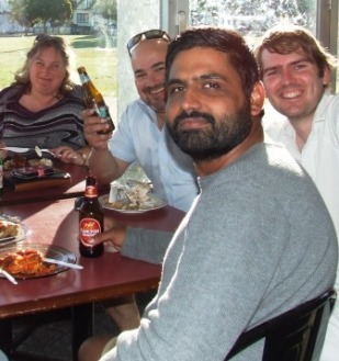 The boys tuck in after a hard grind in the field with the Fourths. L-R Angela McDonald with players James Harris, Jatinder Singh and Kris Lawson.