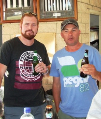 Discussing promotion to the First Eleven: Skipper Nate Wolland (left) with Dean Jukic.