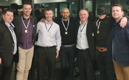 First Eleven Premiership Players: L-R Mark Gauci, Matt Thomas, Geoff McKeown, Raj Aiyappan, Sean O'Kane, Craig Pridham dressed as Batwoman, Kane Harding.