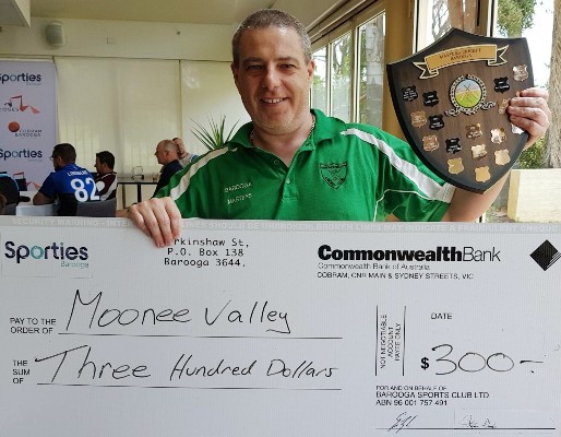 Our team leader Daniel Phillips with the trophy and winning cheque for winning the Barooga Over 35s.