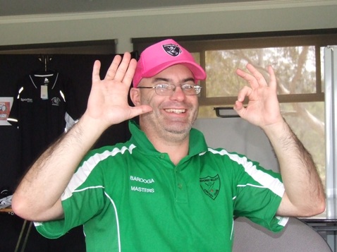 Michael "Mickster" Cumbo holds up a five and a zero to signify 50 - the number of ducks he's now scored for Moonee Valley.
