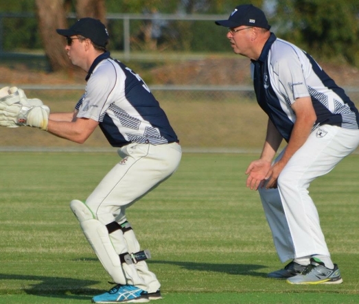 The Moonee Valley Cricket Club emblem is clearly visible on the left hip of Chief Commissioner of Police Graham Ashton, fielding at slip.