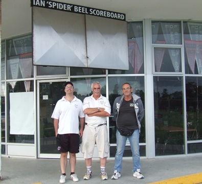 The Ian "Spider" Beel scoreboard will be relocated when the pavilion goes down. Checking it out here are L-R Michael Cumbo, Charlie Walker and Pat Taylor.