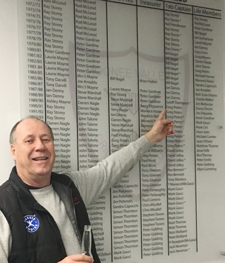 Ian Denny points to some of the illustrious names on the new Moonee Valley Cricket Club honor board.