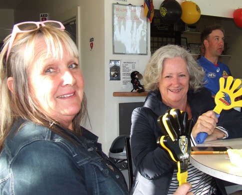 Who are you barracking for? Cricket mums and past players Adele Walker (left) and Vicki Ayers show some true colors.