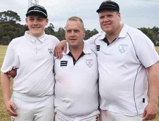 A family celebration - L-R Lachlan, Peter and Geoff play together in the milestone game.