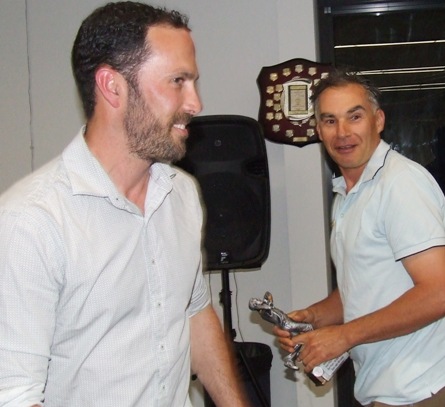 Crossing paths: Michael Ozbun leaves centre stage while Dean Jukic comes forward to accept the Sean O'Kane Award.