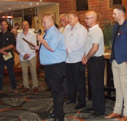Peter Smith has the floor in front of fellow Life Members after being presented with his honor.