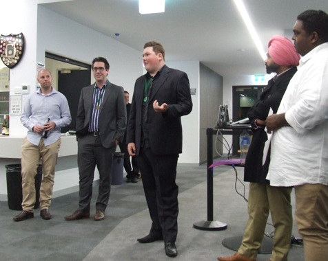 What it means to me: Andreas Skiotis talks about his involvement in the Fourths premiership, while (L-R) Dom Rettino, Ben Skok, Sunny Singh and Channa DeSilva listen intently.