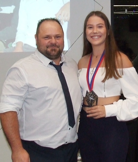 Coach Glen Courts with the winner of the Most Improved Award, Tara Newman.
