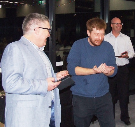 A slightly irreverent take on it: Michael Cumbo (right) is amused as Bede Gannon responds to Peter Golding's citation for his Life Membership.