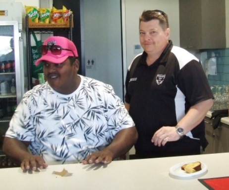 Running the bar for the Polonidis function - Channa DeSilva (left) and Mark Gauci.