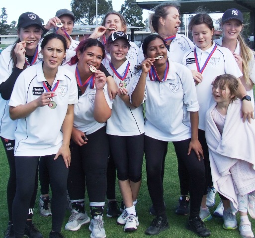 Premiers - and proud to show their medals: L-R Tara Newman, Yasmin King, Sandra Verschoor, Tanya Intagliata, Sarah Ronayne, Katherine Baker, Jane Raman, Sarah Gooden, Audrey Brown and Kelsie Armstrong, with Katherine's sister. Premiers - and proud to show their medals: L-R Tara Newman, Yasmin King, Sandra Verschoor, Tanya Intagliata, Sarah Ronayne, Katherine Baker, Jane Raman, Sarah Gooden, Audrey Brown and Kelsie Armstrong, with Katherine's sister.