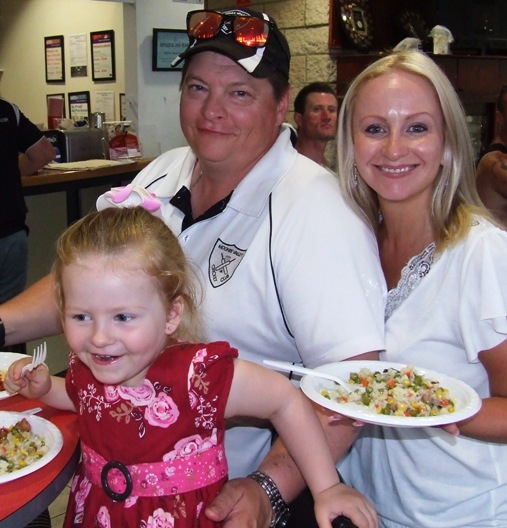 Enjoying the Christmas meal: Mark and Vanessa Gauci with Marley.