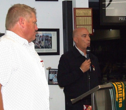 Darren Nagle listens as Life Member John Talone reads his citation for the Lindsay Jones Best Clubman award.