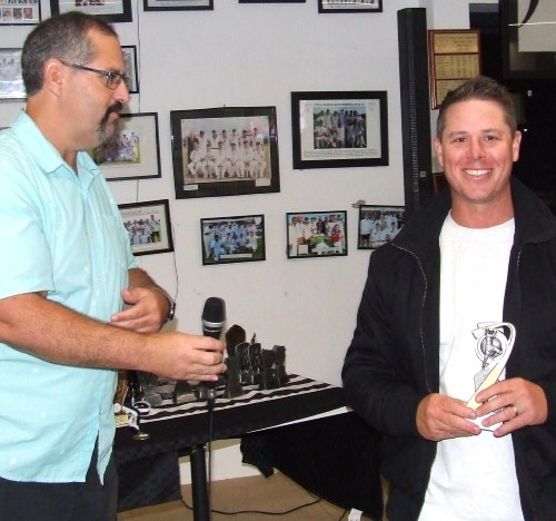Seconds captain Nathan Waites (far right) received his batting award from MC Brendan Rhodes.