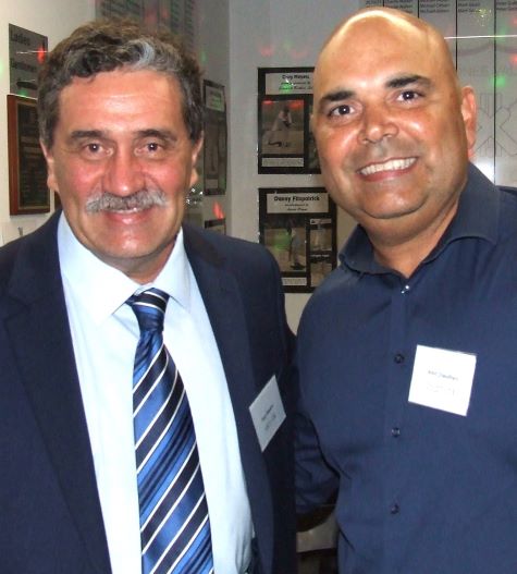 Discussing the finer points of cricket: former Moonee Valley coach Tony Gleeson (left) and MVCC Premiership player Amit Chaudhary.