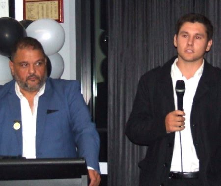 Master of Ceremonies Sandro Capocchi watches on as current First Eleven captain Jack Newman speaks - about the Team of the Decade 2010-20.