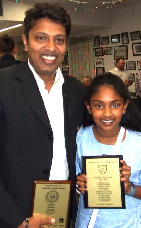 Arosha Perera with daughter Aisha and his two plaques - for Team of the Decade 2000-10 and Team of the Half Century.
