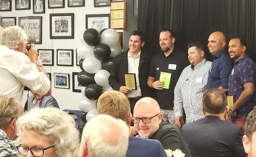 Members of Team 2010-20 line up with their plaques: L-R Jack Newman, Matt Thomas, Mark Gauci, Amit Chaudhary and Shiwantha Kumara.