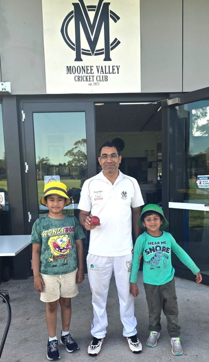 Sudarshan Devkota celebrates his 50th wicket with sons Swatit and Swakrit.