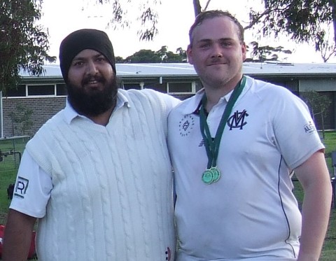 Manu Singh with Lachlan Smith - a Premiership Medal to go with his Player of the Match medallion.