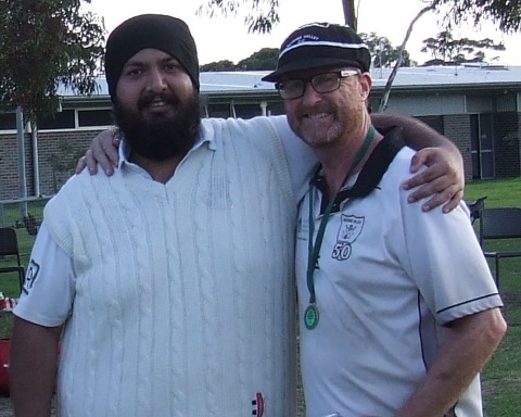 Dean Lawson (far right) after being presented his Premiership medallion by Manu Singh.