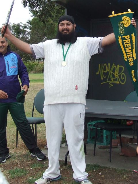 The victorious skipper: Manu Singh with the shield and flag.