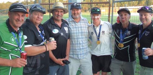 Celebrating the Seconds flag: L-R Dom Gibaldi, Mark Gauci, Tony Gleeson, Tony Morrissy, Zac Nilsson, Jim Polonidis and Geoff McKeown.