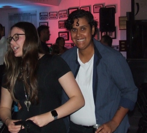 Enjoying the music and the party lights: Moonee Valley premiership players Tara Newman (left) and Jane Greenshields.