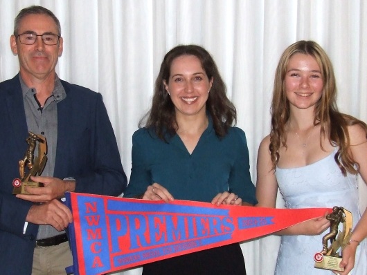 A happy trio at the NWMCA awards night - L-R James Smith with his batting award, Sarah Fenn with the Premiership pennant and Katherine Baker with her bowling award.