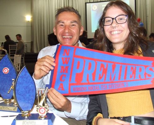 Plenty to celebrate: Dean Jukic with his bowling award and Tara Newman with the Premiership flag.