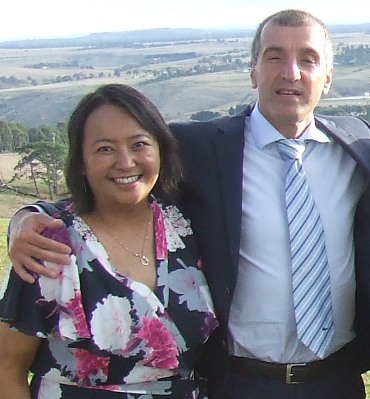 Tien Polonidis with husband Jim on one of her most recent club outings - the wedding of Matt and Vanessa Thomas in May.