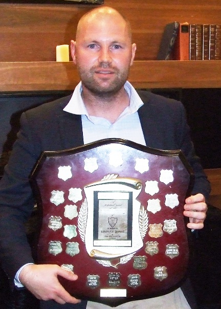 Dominic Rettino proudly holds the Shield acknowledging his 2021/22 Lindsay Jones Best Clubman award.